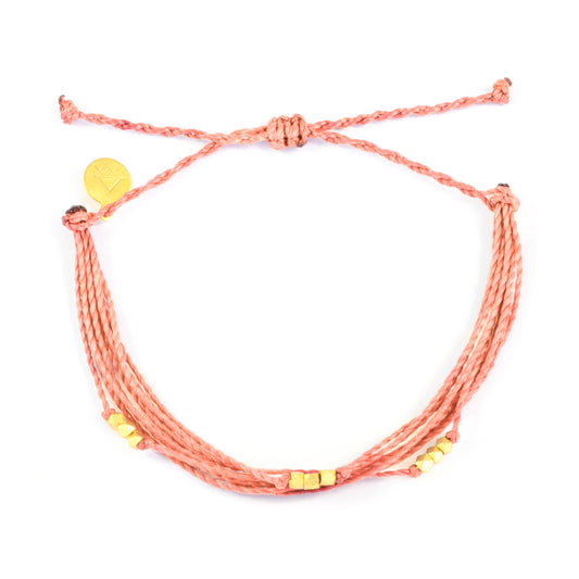 Nica Life - Coral Macua in Gold