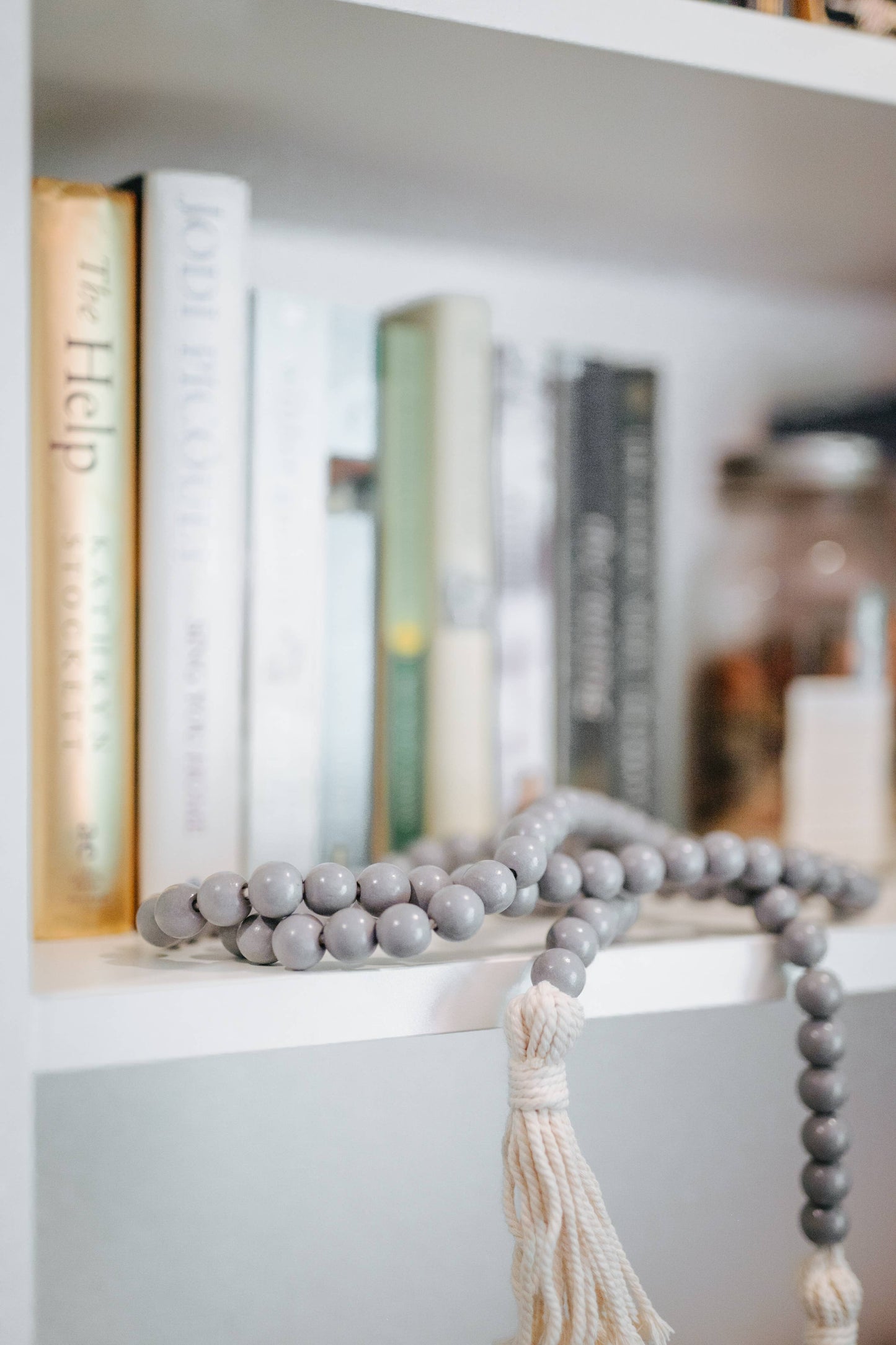 Ivy and Sage Market - Gray Wood Bead Garland with Tassels